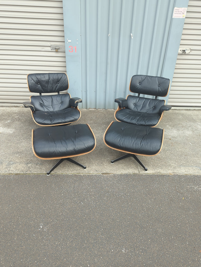 Restoration of pair of original Charles Eames chairs with ottomans