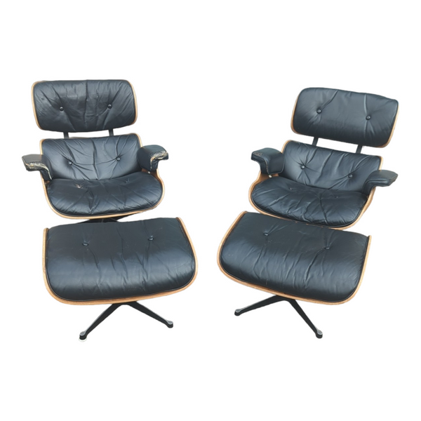 Restoration of pair of original Charles Eames chairs with ottomans