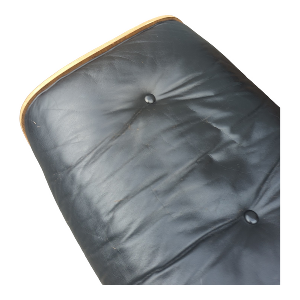 Restoration of pair of original Charles Eames chairs with ottomans