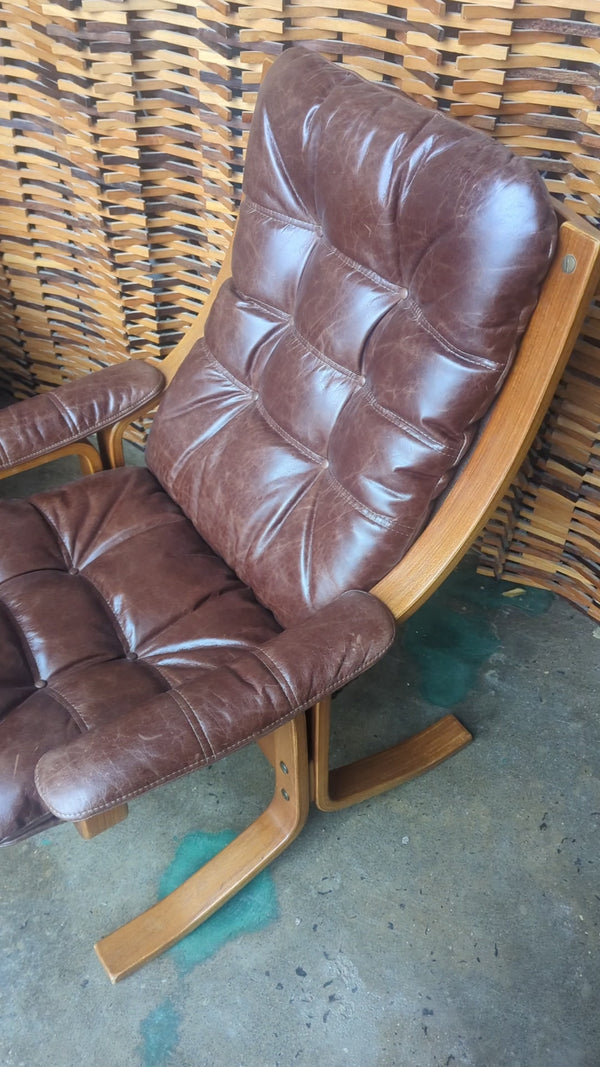 Restoration refinishing upholstery of pair of Danish Deluxe armchairs