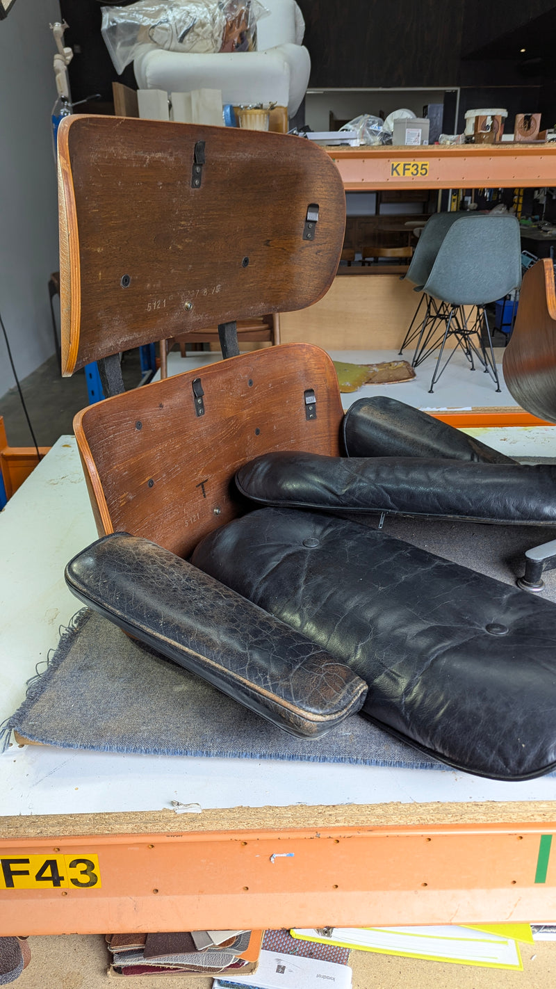 Restoration of original Charles Eames pair of armchairs and ottoman original Herman Miller 1970s