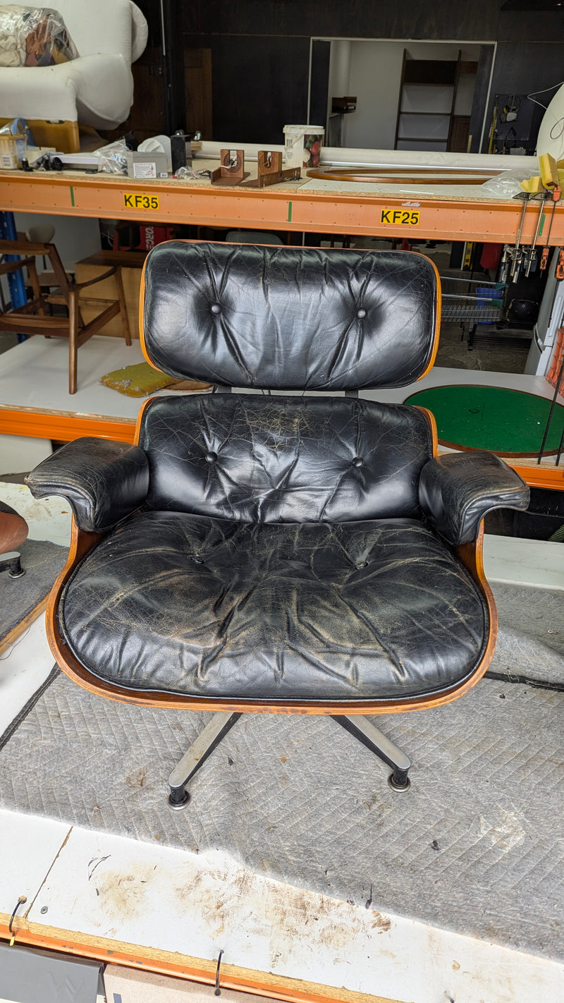 Restoration of original Charles Eames pair of armchairs and ottoman original Herman Miller 1970s