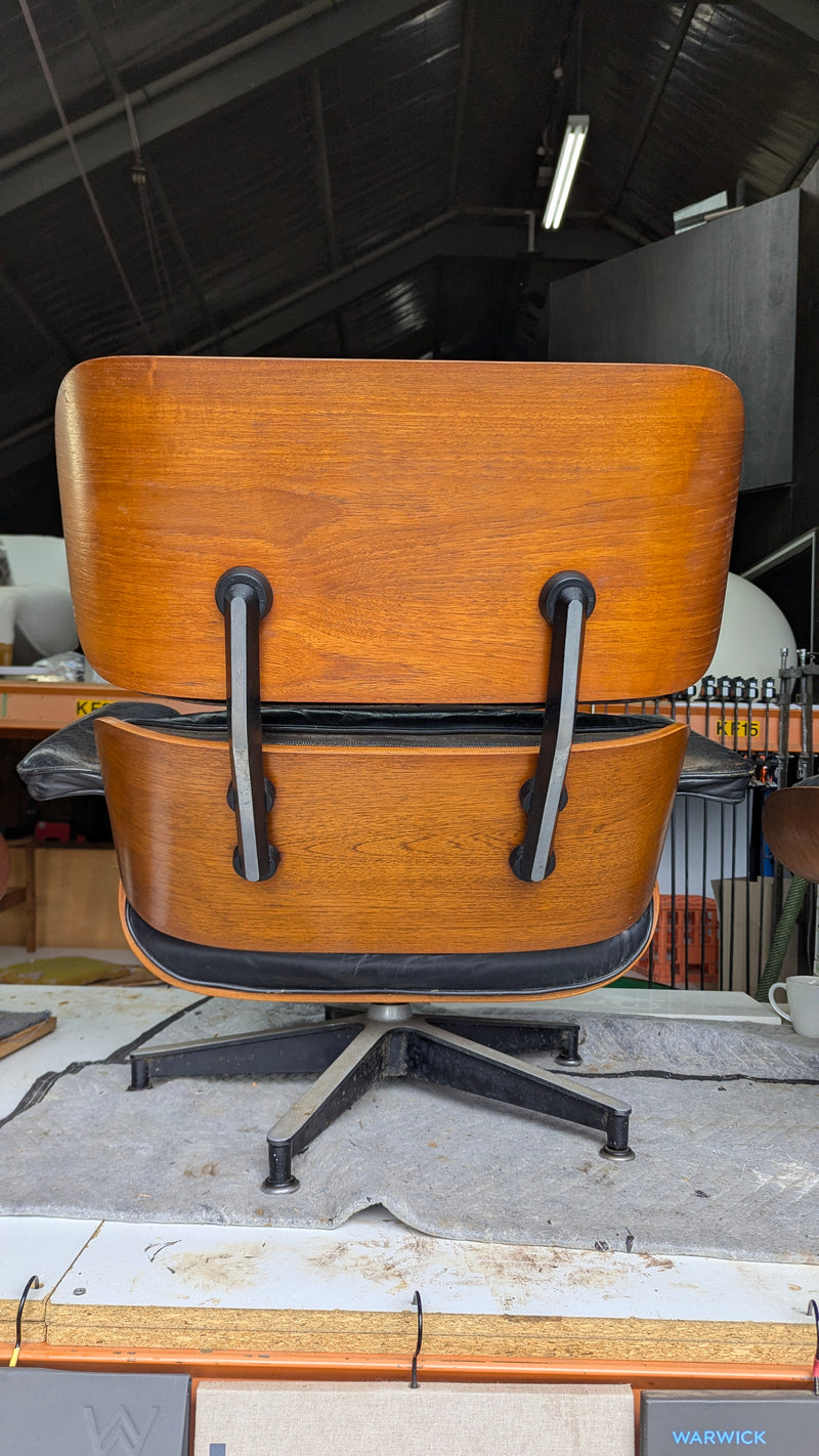 Restoration of original Charles Eames pair of armchairs and ottoman original Herman Miller 1970s