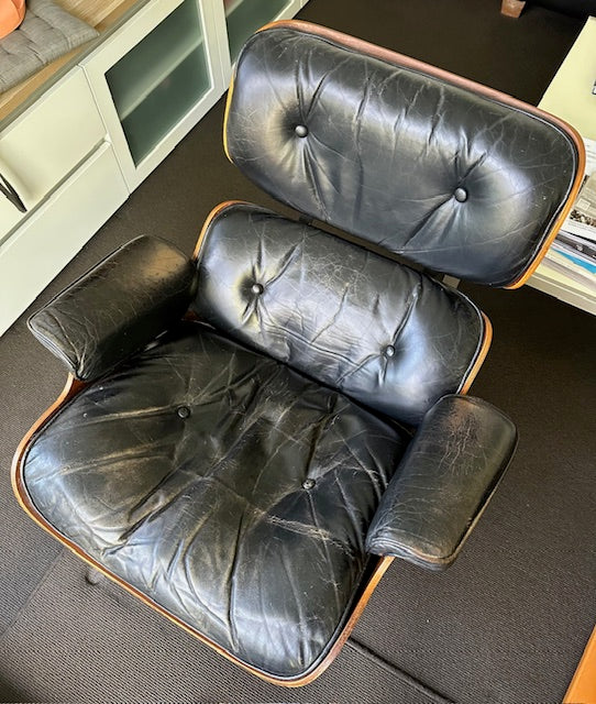 Restoration of original Charles Eames pair of armchairs and ottoman original Herman Miller 1970s