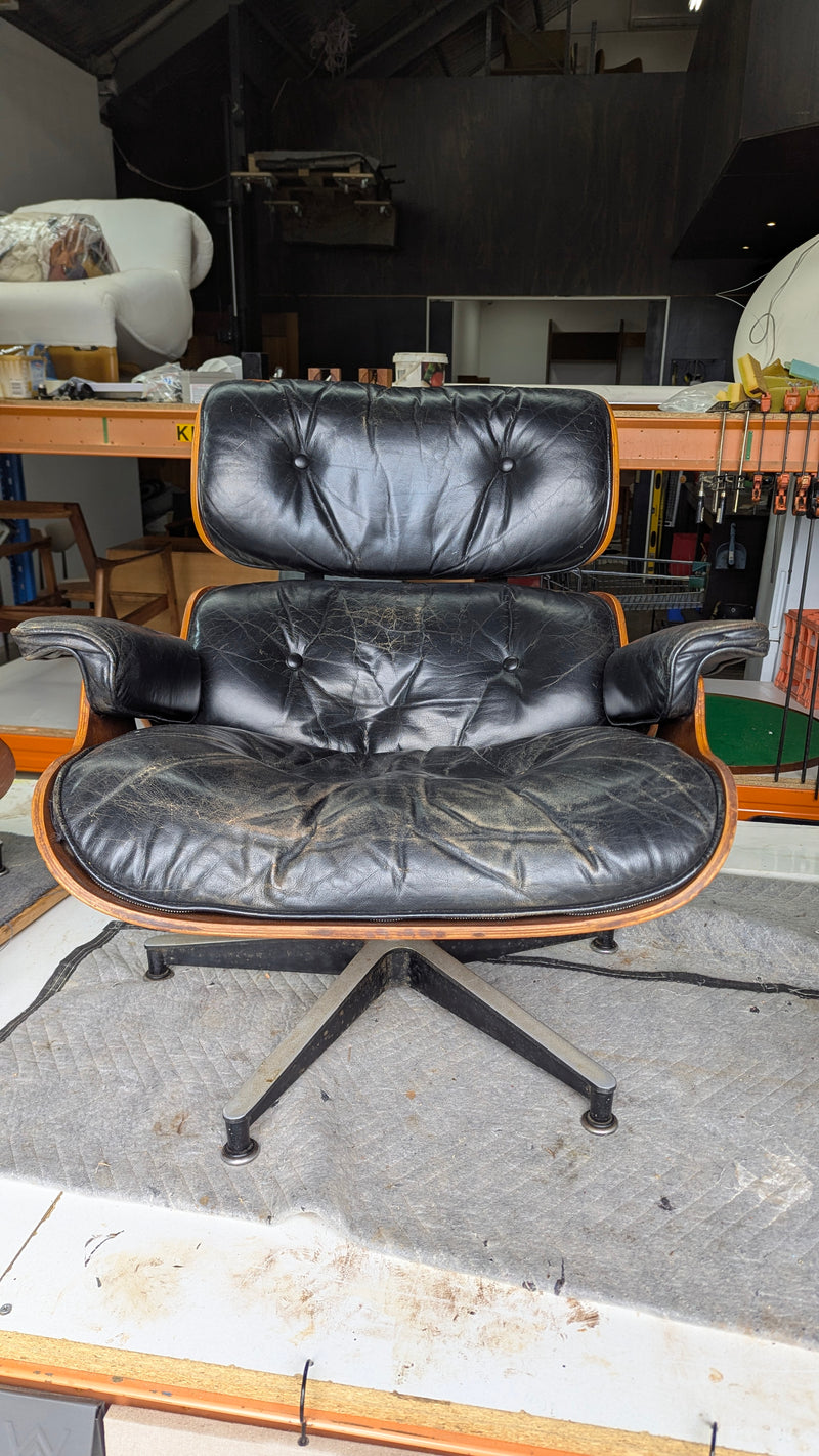 Restoration of original Charles Eames pair of armchairs and ottoman original Herman Miller 1970s