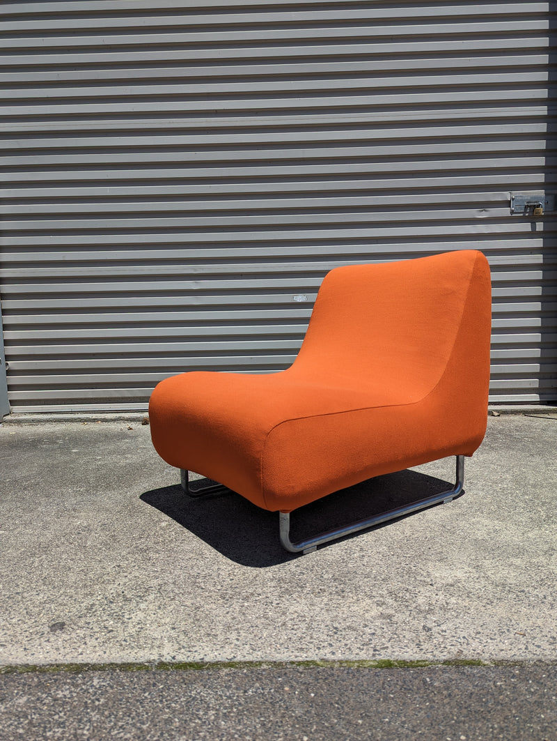 Vanderoza low sleigh foam armchair mid century orange