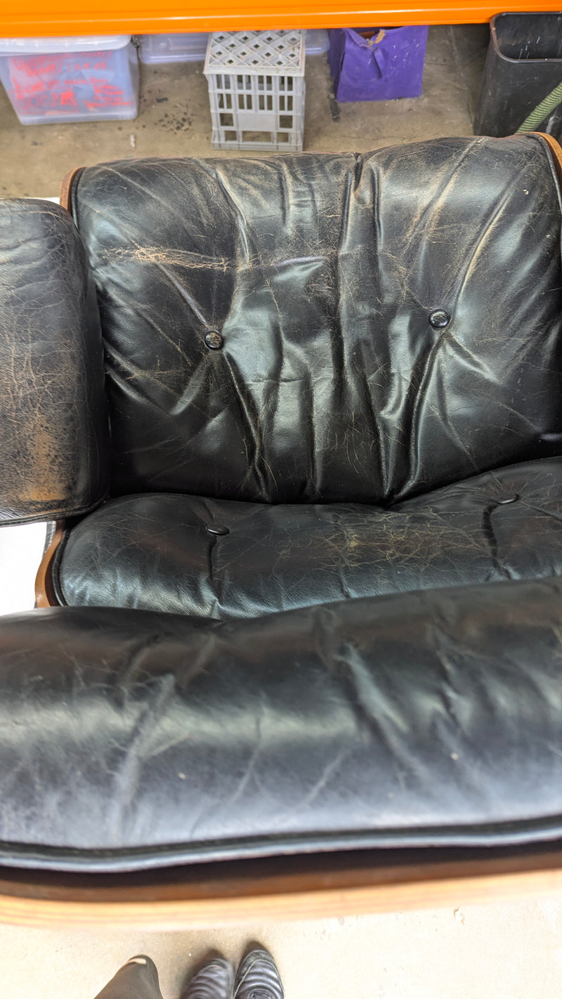 Restoration of original Charles Eames pair of armchairs and ottoman original Herman Miller 1970s