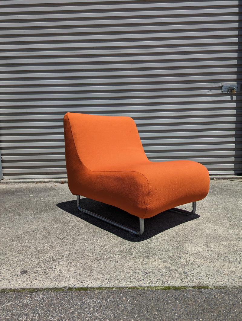 Vanderoza low sleigh foam armchair mid century orange