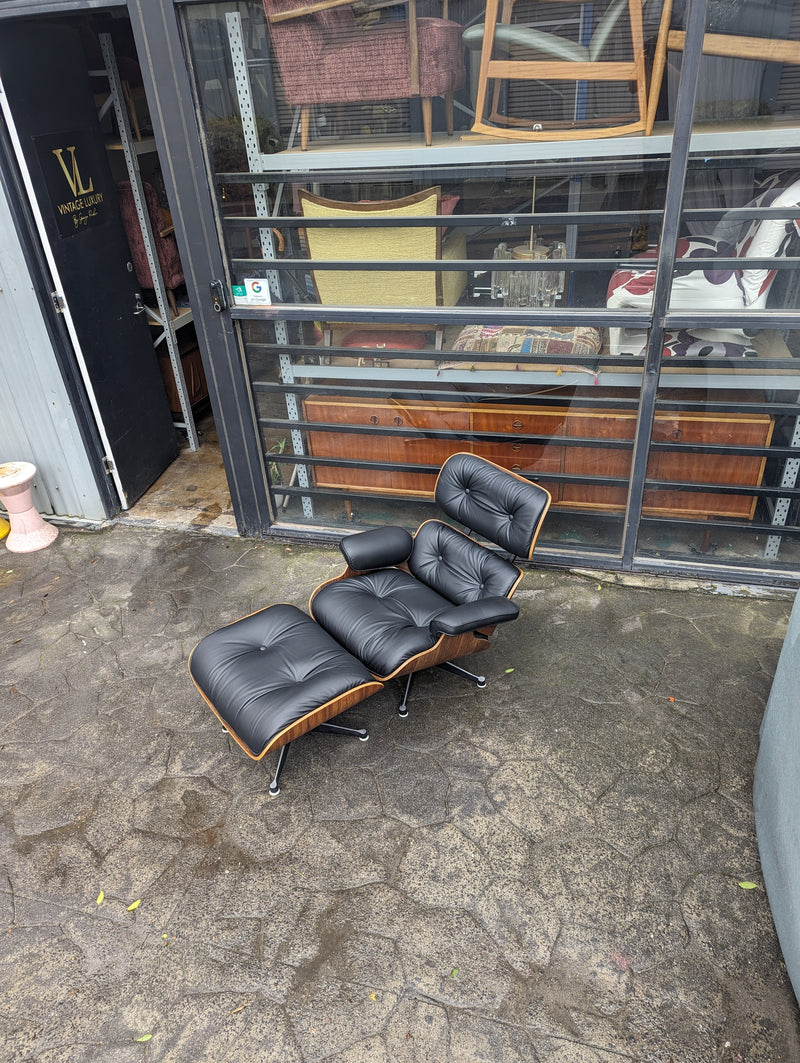 Restoration of pair of original Charles Eames chairs with ottomans
