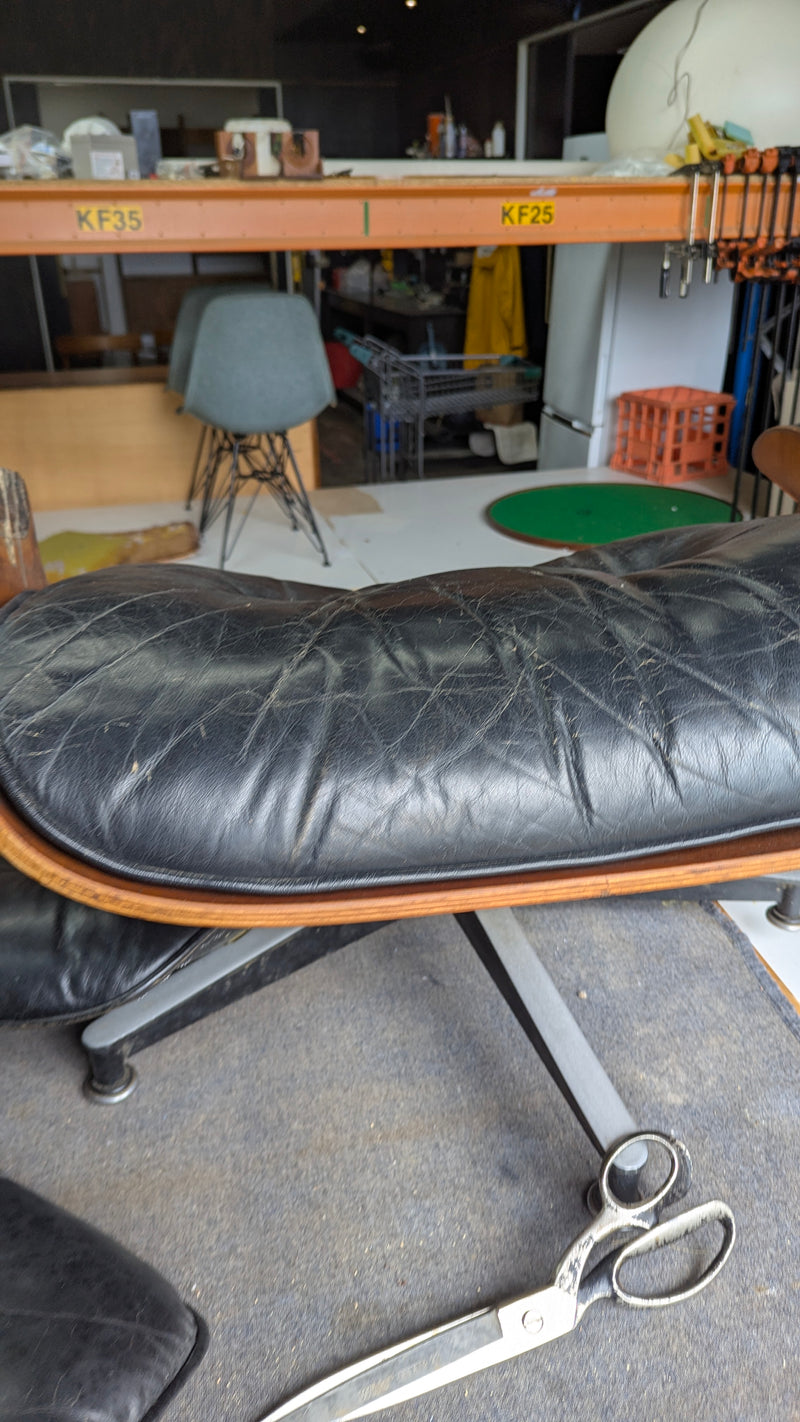 Restoration of original Charles Eames pair of armchairs and ottoman original Herman Miller 1970s