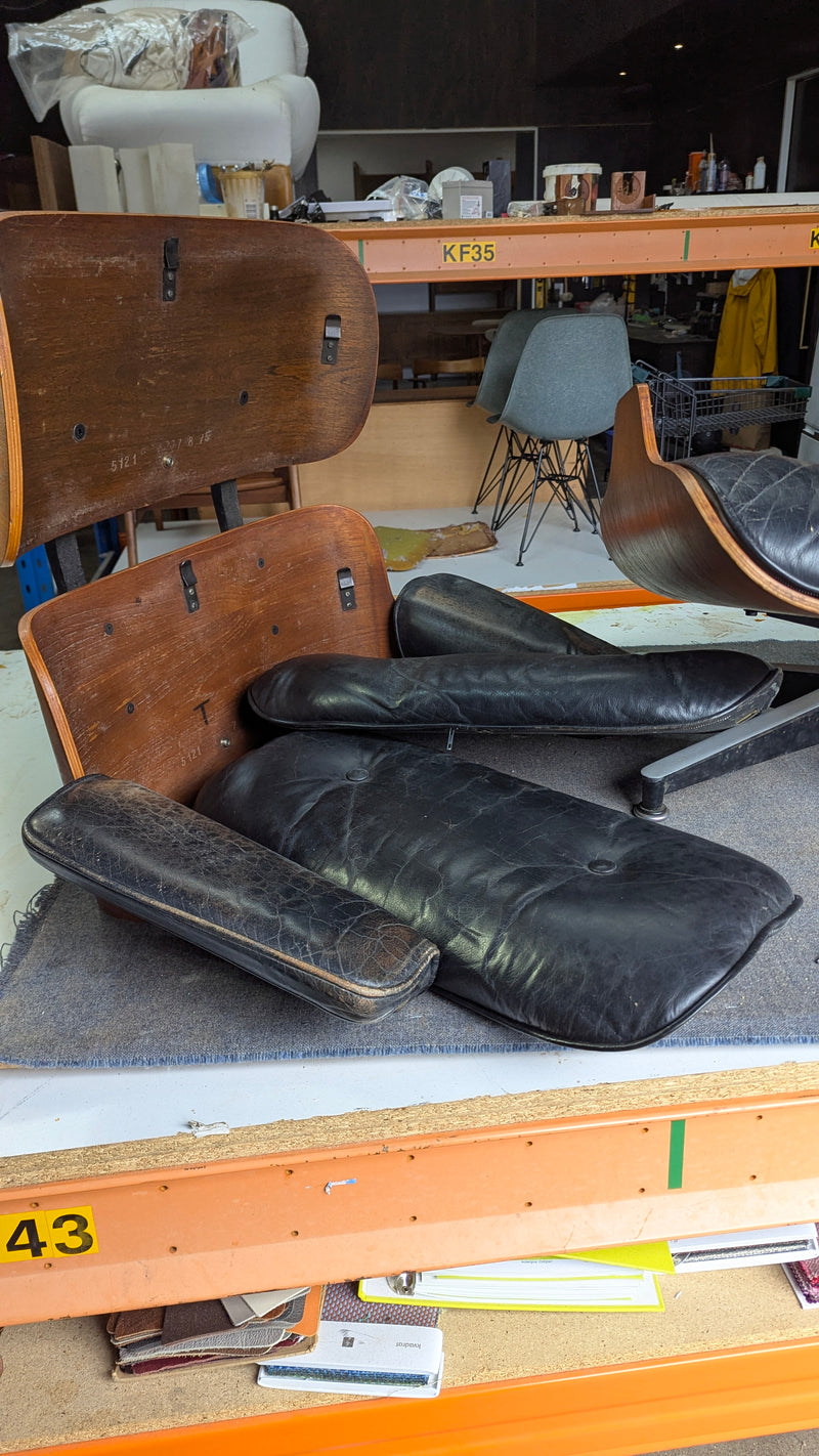 Restoration of original Charles Eames pair of armchairs and ottoman original Herman Miller 1970s