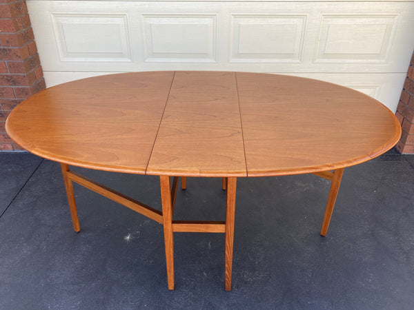 Golden teak Authentic Parker oval dining table MCM extendable drop 1960s