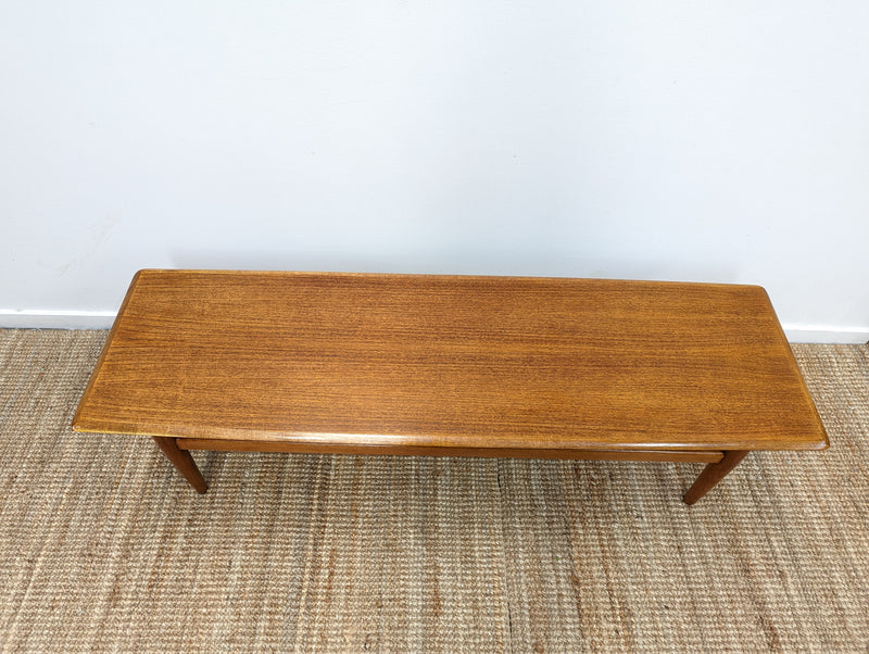Coffee table teak magazine rack MCM 1960s restored golden brown