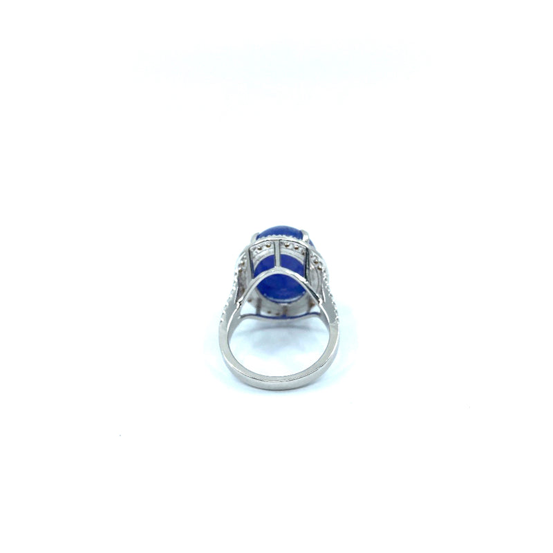 Custom made 18ct white gold with 21ct Tanzanite oval cabochon 60 round cut brilliant diamonds halo style ring