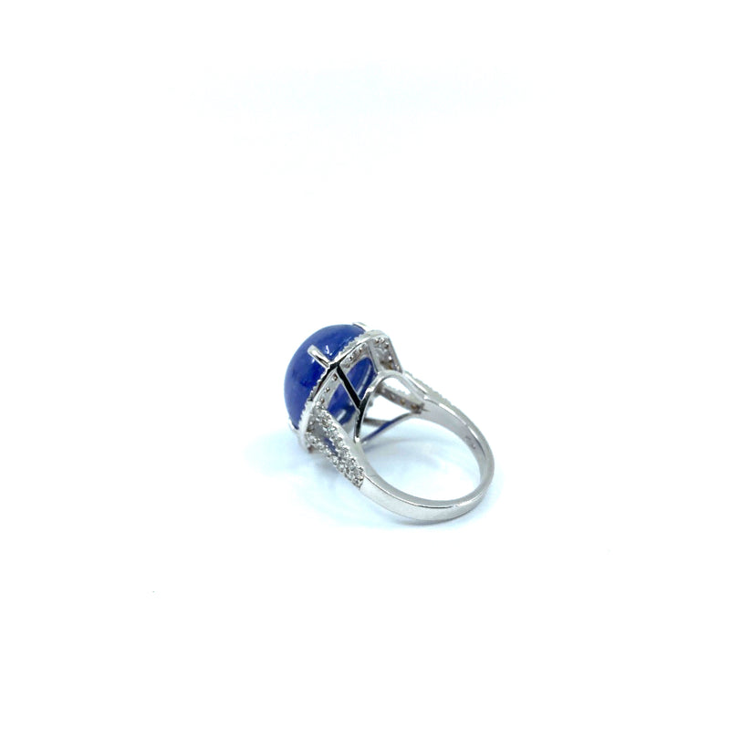 Custom made 18ct white gold with 21ct Tanzanite oval cabochon 60 round cut brilliant diamonds halo style ring